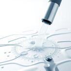 fuel-spray-interaction:-role-of-surface-composition-and-topology